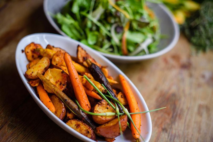 Barn and table catering dish which consist of plantain and other veggies