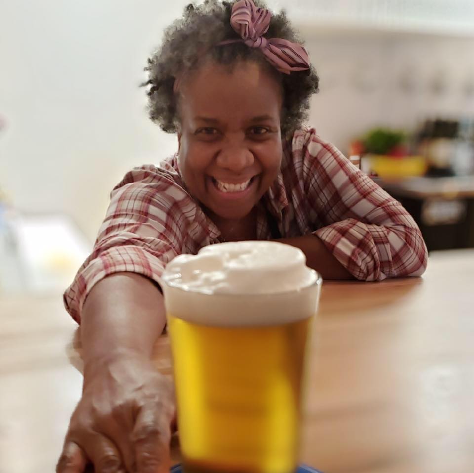 Woman Enjoying a drink in knitting nook