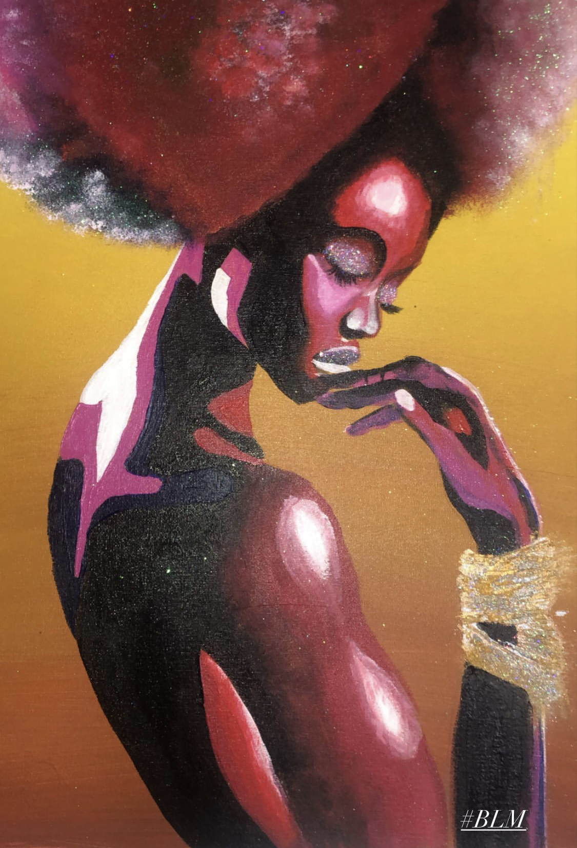 Artwork of a woman on afro inJamal's art boutique