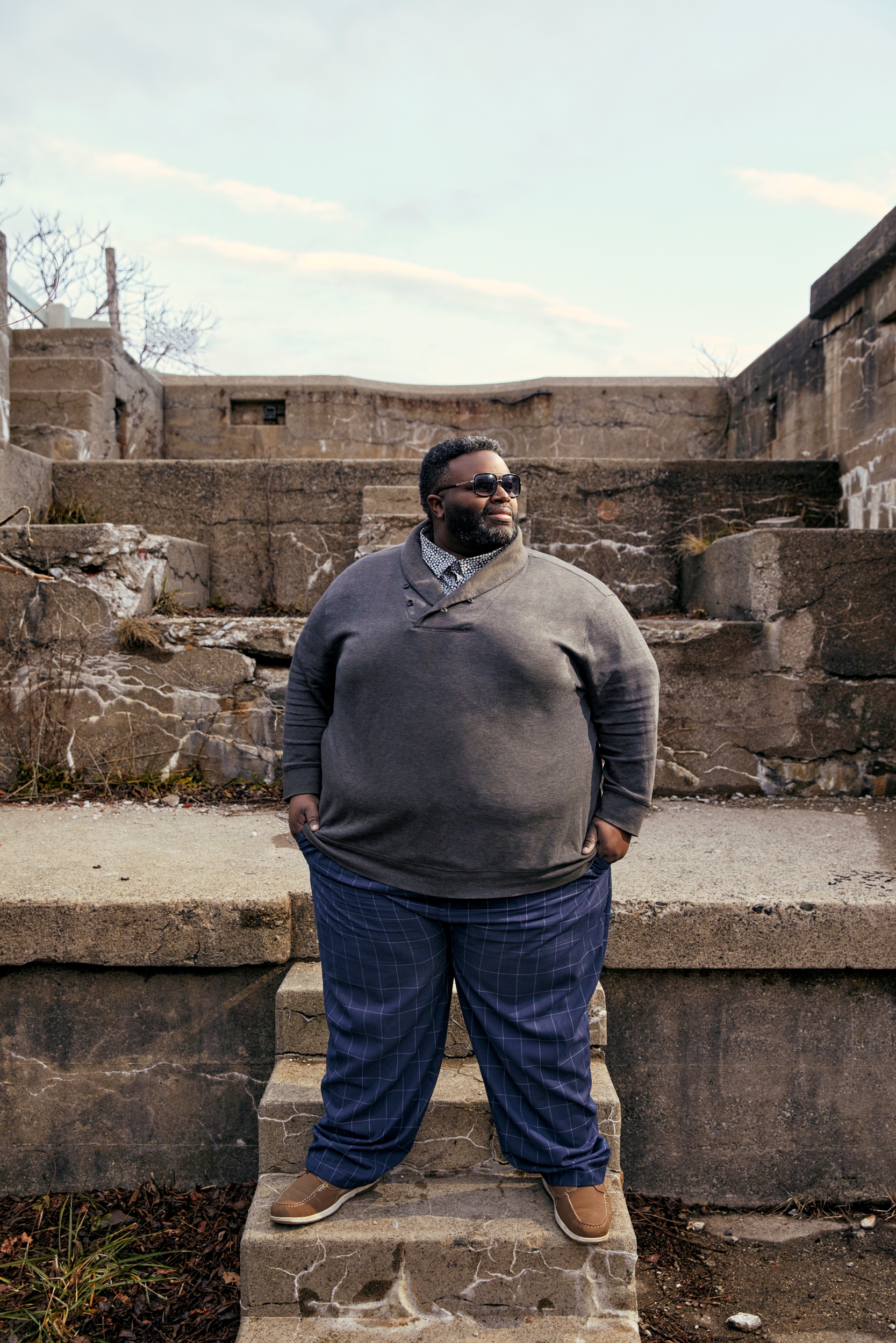 Karl Brucemus Lee standing for a photo shoot