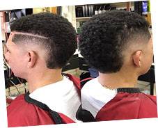 High fade men hair cut done in King and Queen hair studio